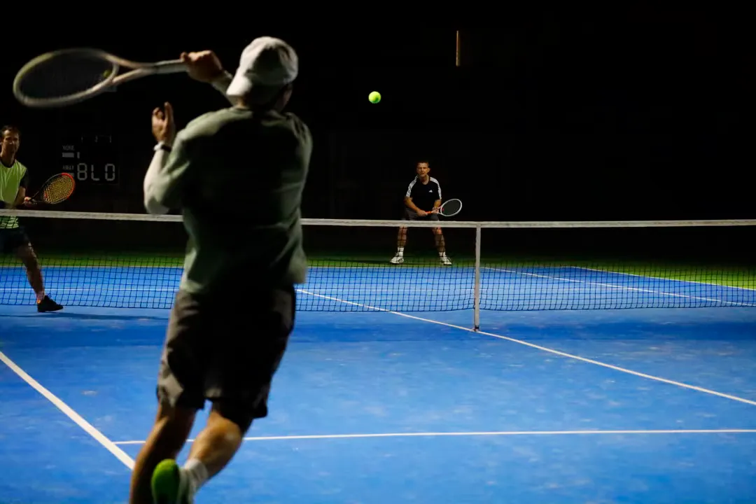 Playing tennis under the lights in winter at the Waimairi Tennis Club